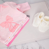 Baby girl bodysuits and pom pom booties