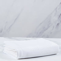 White cotton cellular blanket.