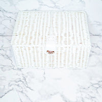 White resin basket with leather lock. 