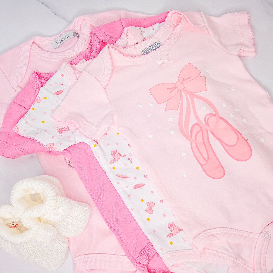 Pink baby girl clothes and booties
