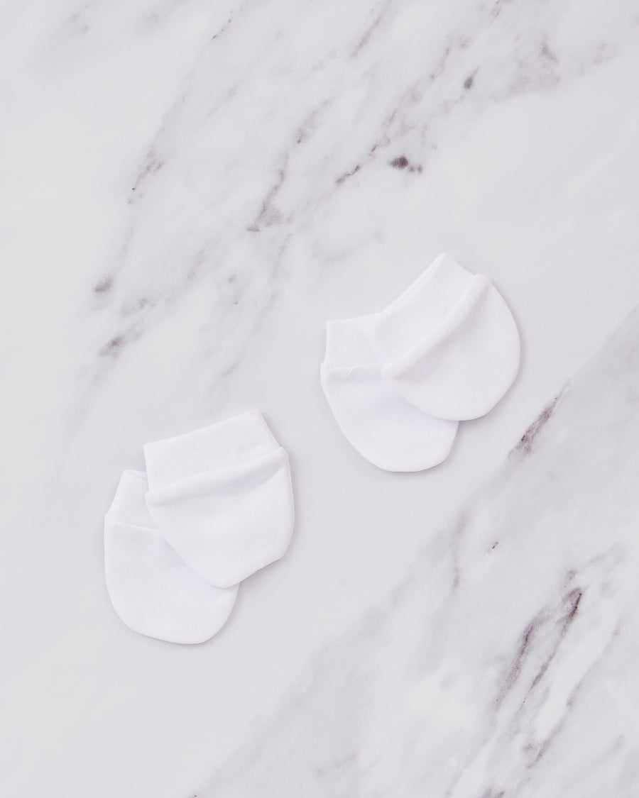 2 Pairs of baby cotton mittens, white. 