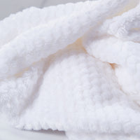 White baby waffle blanket, polyester. 