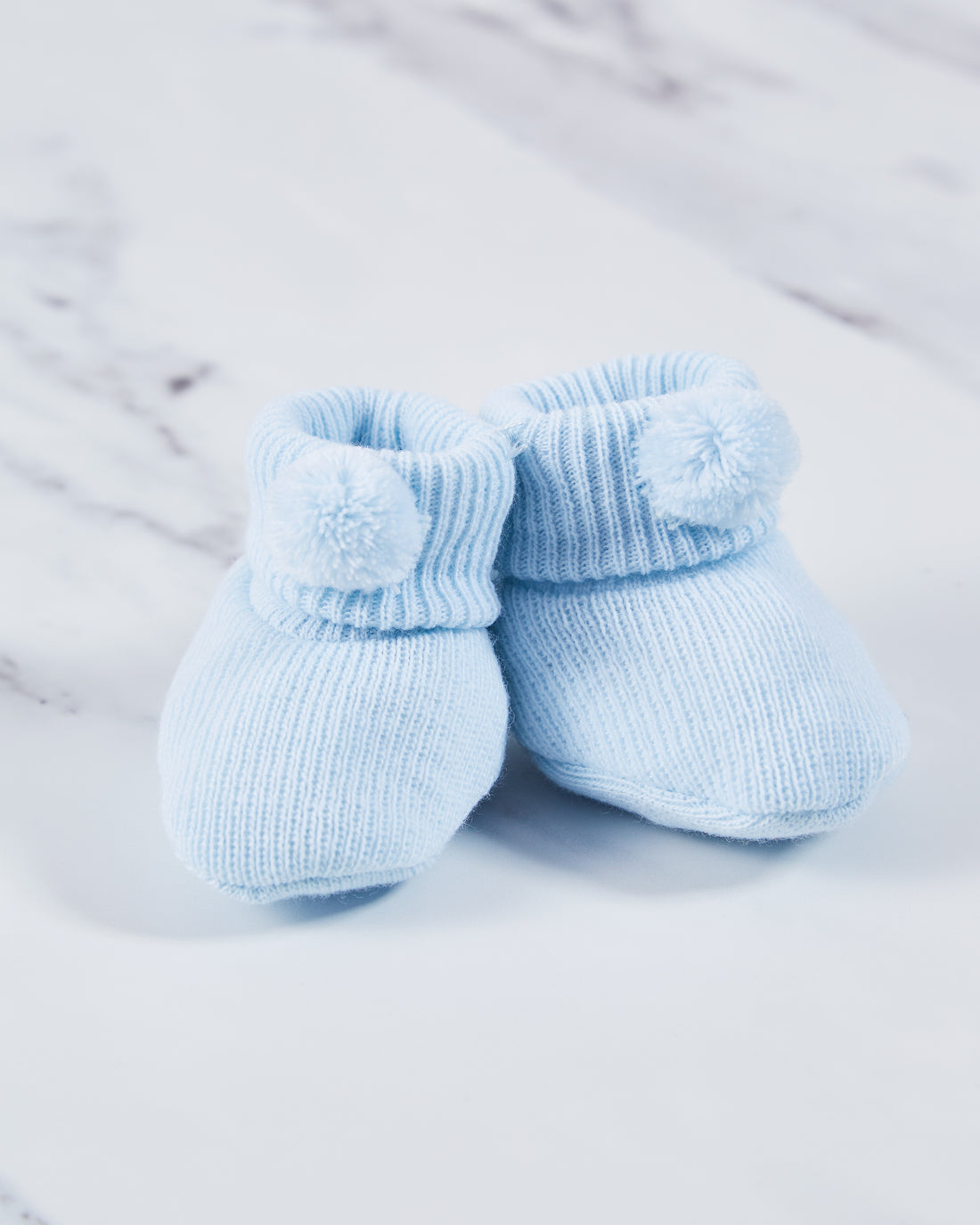 Blue baby booties. 